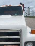 (TITLE) 1988 International S 2300 Tandem Grain Truck, 466 Diesel Engine, Air Brakes, Straight 7 Speed Transmission, 8’ Wide, 10’2” Tall, 26’ Long, Empty Weight Estimated 19,000-20,000#, 11R22.5 Tires (Good), Twin Screw, Spring Suspension ,Clutch And Front End Work Less Than 500 Miles Ago, 18’ Metal Grain Bed W/ Steel Floor (Nice), 64” Steel Sides, Single Post Hoist, Rust Free Frame And Cross Members,  Been Shedded Several Years, Great Tandem Truck, Miles Unknown’s