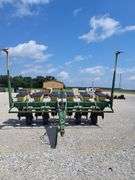 John Deere 7000 6-Row Planter, No-Till Coulters, Insecticide Boxes, Row Harrows, Good Boxes, Bean Cups, Corn Meters, Good Tires, Comes With JD Monitor in Unknown Condition.