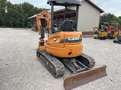 Case CX36B Mini Excavator, 698.6 hours, 12” Wide Rubber Tracks, 67” wide Blade, 36” Smooth Bucket, 18” Toothed Bucket, Pilot Controls, Hydraulic Thumb, Yanmar Diesel Engine Model #3TNV88-BPYB, 28 hp., Service at 671.9 hrs., Dent on Front and Side, 8,000 lb, 10’ Digging Depth,
