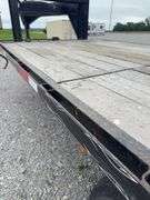 (TITLE) 2002 Load Master Gooseneck Flat Trailer, TITLE, 15’ Deck W/ 10’ Hydraulic Beaver Tail, 25’ Overall Length, Matching Delta LT 235/85/16 Radials 90% Tread, Good Oak Deck, New Spare Tire, Dual Axel W/Singles, Brakes Work, Selling For A Retiring Farmer.