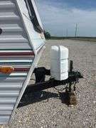 1998 Jayco  28’ Camper Trailer, Everything Works Per Consignor, Window Seals Recaulked,Good Tires, New Spare Tire, Eagle Model, Double Bed, (2) Single Bunk Beds, Above Average Condition For Its Age. Been Used By A Smoker.