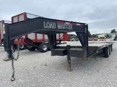 (TITLE) 2002 Load Master Gooseneck Flat Trailer, TITLE, 15’ Deck W/ 10’ Hydraulic Beaver Tail, 25’ Overall Length, Matching Delta LT 235/85/16 Radials 90% Tread, Good Oak Deck, New Spare Tire, Dual Axel W/Singles, Brakes Work, Selling For A Retiring Farmer.