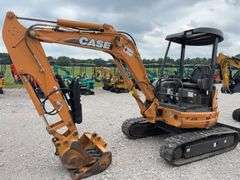 Case CX36B Mini Excavator, 698.6 hours, 12” Wide Rubber Tracks, 67” wide Blade, 36” Smooth Bucket, 18” Toothed Bucket, Pilot Controls, Hydraulic Thumb, Yanmar Diesel Engine Model #3TNV88-BPYB, 28 hp., Service at 671.9 hrs., Dent on Front and Side, 8,000 lb, 10’ Digging Depth,
