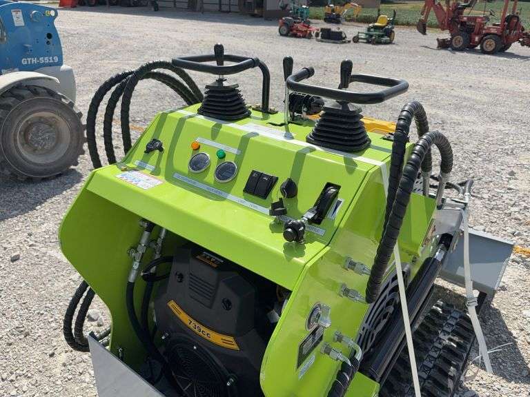 Unused Wuxi Landhero Mini Skid Steer Loader, Model # LDH-T460, 23 HP Gas Engine, Lifting Capacity 840 Lbs, Dumping Height 60”, Rubber Tracks 7” wide, 43” Wide Quick Attach Smooth Bucket, Remote Hydraulics on Loader Arms,