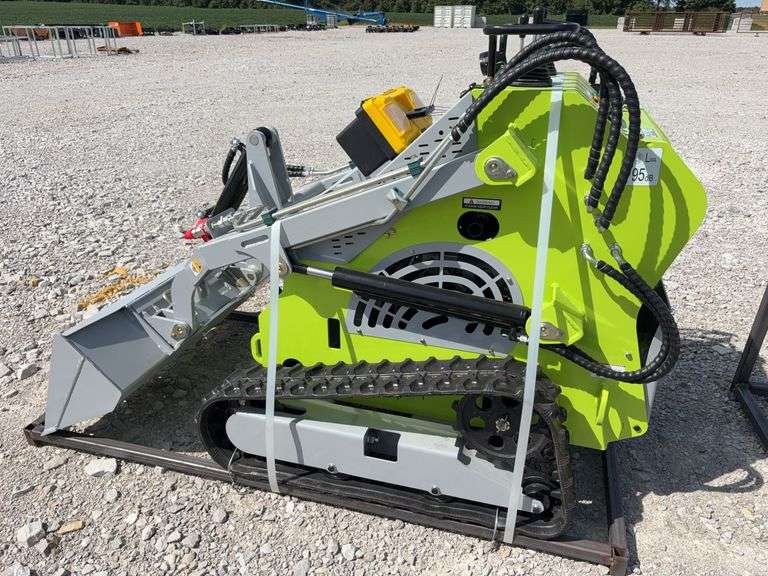 Unused Wuxi Landhero Mini Skid Steer Loader, Model # LDH-T460, 23 HP Gas Engine, Lifting Capacity 840 Lbs, Dumping Height 60”, Rubber Tracks 7” wide, 43” Wide Quick Attach Smooth Bucket, Remote Hydraulics on Loader Arms,