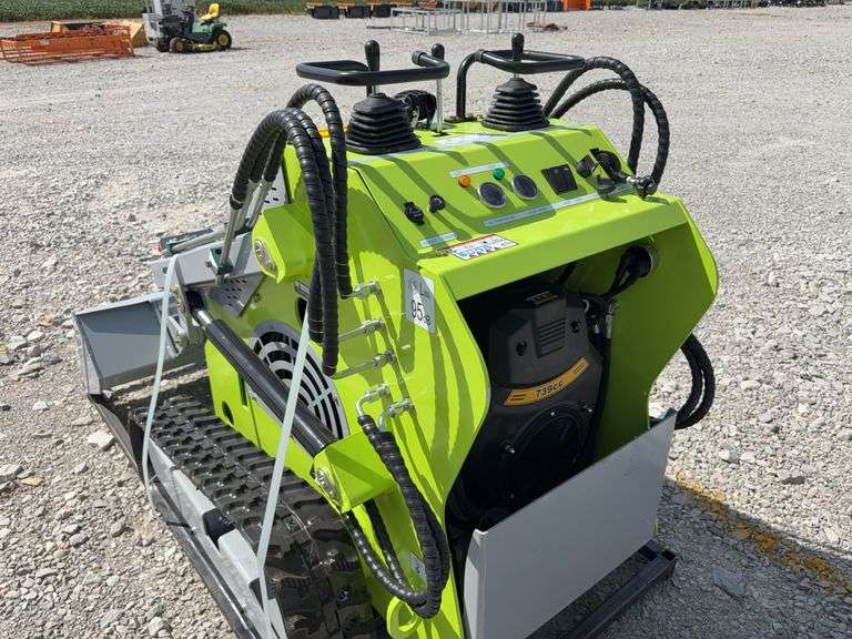 Unused Wuxi Landhero Mini Skid Steer Loader, Model # LDH-T460, 23 HP Gas Engine, Lifting Capacity 840 Lbs, Dumping Height 60”, Rubber Tracks 7” wide, 43” Wide Quick Attach Smooth Bucket, Remote Hydraulics on Loader Arms,