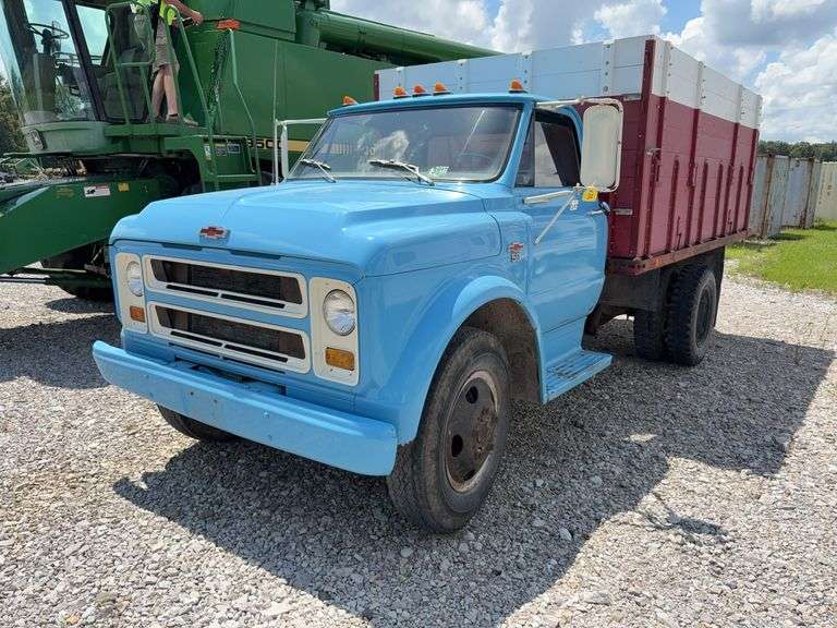(TITLE) 1967 Chevy C-50, 2 Ton Grain Truck, V-8 Gas Engine, Good Brakes, Consignor drove it to auction yard, Always Shedded, Needs a Tune Up, Title In Hand, Truck Starts Right Up, Good Grain Bed floor and Sides, Service Repair Manual included, Rust on Bottom of Both Doors, Manual 4 Speed, Bed Raises and Lowers, Tire Tread 40%, Odometer shows 29,551 miles,