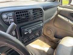 (TITLE) 1999 Chevrolet Blazer,  Touch 4 Wheel Drive, Starts And Runs, AM/FM CD Player, AUX Jack, Cruise Control, Power Steering, Push Button Rear Hatch, Rear Defrost, Leather Front Bucket Seats In Rough Condition, Center Counsel Is Broken, Hood Release Latch In Cab IS Broke, Back Hatch Opens, P235/75R15 Tires Approx 50% Tread, Body in Fair Condition Just Scratches and Losing Clearcoat and Some Minor Dents, 180,202 Miles, Does Have Dead Battery, Signed Title In Hand