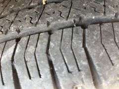 (TITLE) 1999 Chevrolet Blazer,  Touch 4 Wheel Drive, Starts And Runs, AM/FM CD Player, AUX Jack, Cruise Control, Power Steering, Push Button Rear Hatch, Rear Defrost, Leather Front Bucket Seats In Rough Condition, Center Counsel Is Broken, Hood Release Latch In Cab IS Broke, Back Hatch Opens, P235/75R15 Tires Approx 50% Tread, Body in Fair Condition Just Scratches and Losing Clearcoat and Some Minor Dents, 180,202 Miles, Does Have Dead Battery, Signed Title In Hand