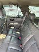 (TITLE) 1999 Chevrolet Blazer,  Touch 4 Wheel Drive, Starts And Runs, AM/FM CD Player, AUX Jack, Cruise Control, Power Steering, Push Button Rear Hatch, Rear Defrost, Leather Front Bucket Seats In Rough Condition, Center Counsel Is Broken, Hood Release Latch In Cab IS Broke, Back Hatch Opens, P235/75R15 Tires Approx 50% Tread, Body in Fair Condition Just Scratches and Losing Clearcoat and Some Minor Dents, 180,202 Miles, Does Have Dead Battery, Signed Title In Hand