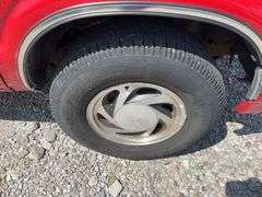 (TITLE) 1999 Chevrolet Blazer,  Touch 4 Wheel Drive, Starts And Runs, AM/FM CD Player, AUX Jack, Cruise Control, Power Steering, Push Button Rear Hatch, Rear Defrost, Leather Front Bucket Seats In Rough Condition, Center Counsel Is Broken, Hood Release Latch In Cab IS Broke, Back Hatch Opens, P235/75R15 Tires Approx 50% Tread, Body in Fair Condition Just Scratches and Losing Clearcoat and Some Minor Dents, 180,202 Miles, Does Have Dead Battery, Signed Title In Hand