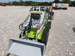 Unused Wuxi Landhero Mini Skid Steer Loader, Model # LDH-T460, 23 HP Gas Engine, Lifting Capacity 840 Lbs, Dumping Height 60”, Rubber Tracks 7” wide, 43” Wide Quick Attach Smooth Bucket, Remote Hydraulics on Loader Arms,