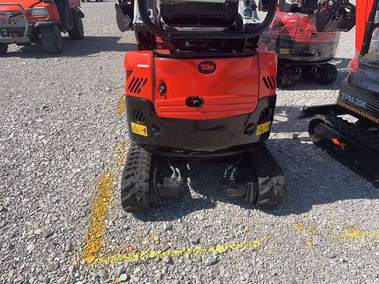 Unused TPM-20K Diesel Mini Excavator, Yanmar 374 Diesel Engine, 11.2KW Kubota Diesel Engine, 3100lb Operating Weight, Pilot Controls, Power Shut Off, Hydraulic Arm, Light On Arm, 16” Bucket With 3 Teeth, 43” Push Blade, 7” Rubber Tracks, Rear Door For Engine Maintenance, 4 Post Canopy, Arm Rests, Counter Weight, Hour Meter