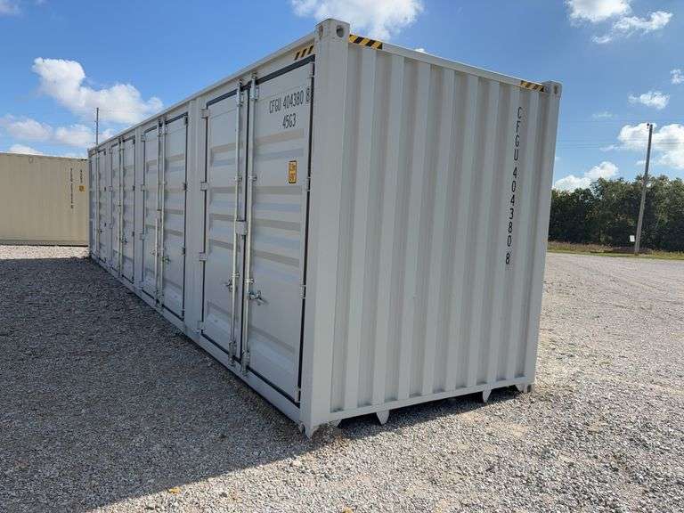 40’ AGT 4 Side Doors and 1 Back Door Container, 40' long x 8' wide,
1 ea. Back Doors measures 102" tall X 92" wide,
4 ea. Side Doors  measures  98" tall X 92" wide,
inside dimension 89” wide,
Tie down anchors on inside of container,
Minor floor scratches on inside, minor wall scratches and dents, 
All doors have weatherstripping, 
1 time use,
Has vents on side walls, 
Container # CFGU 404380 8