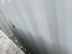 MMS 10’-3’’ container, measures 10’-1” long x 7’-3 1/2” wide x 8’-3” tall, swinging rear doors, Side walk door, sliding window, keyed lock on walk door, wood floor, container CTTN 0002089, Small Paint Scratches, Window Damage