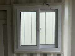 MMS 10’-3’’ container, measures 10’-1” long x 7’-3 1/2” wide x 8’-3” tall, swinging rear doors, Side walk door, sliding window, keyed lock on walk door, wood floor, container CTTN 0002089, Small Paint Scratches, Window Damage