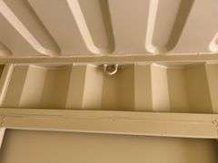 MMS 10’-3’’ container, measures 10’-1” long x 7’-3 1/2” wide x 8’-3” tall, swinging rear doors, Side walk door, sliding window, keyed lock on walk door, wood floor, container # CTTN 0000470, Damage to Window, Paint Scratch on Inside Back Wall