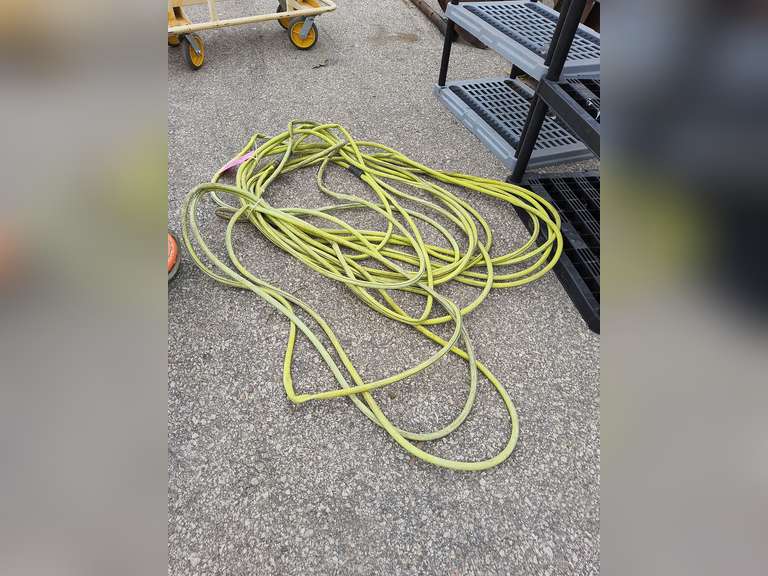 Green garden hose Lindsay Auctions & Realty LLC