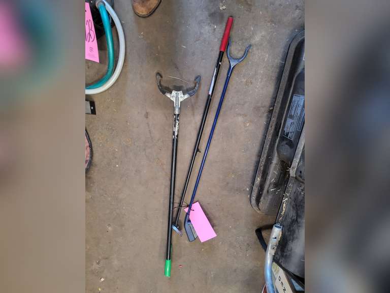 2 grease guns, suction gun, magnet, tow strap, 2 framing squares, grab handles