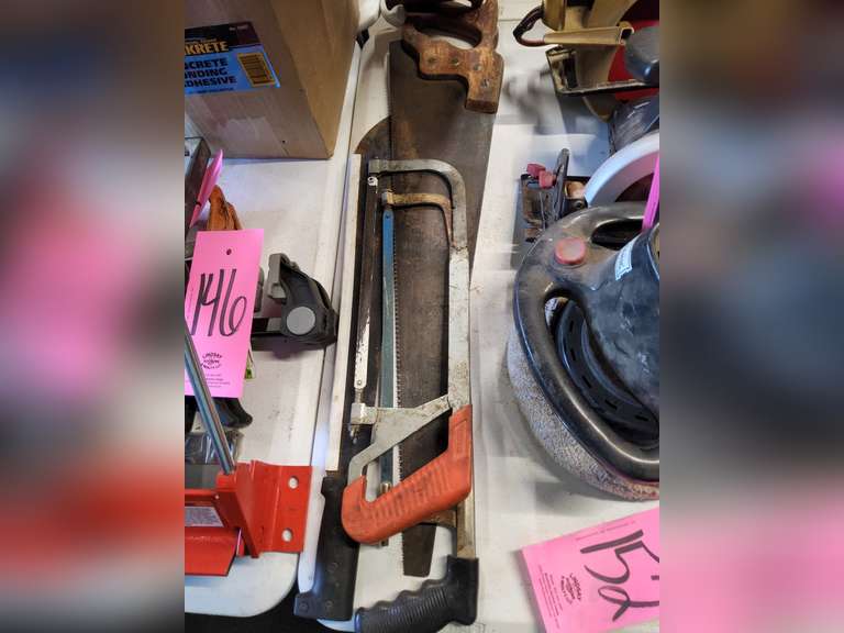 Group: 2 hand saws, 2 hack saws, 2 framing squares, 2 levels