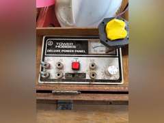 Radio controlled accessories, deluxe pwr panel, elec fuel pump, plane propellers, half gallon of fuel & other misc in wood case
