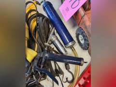 2 grease guns, suction gun, magnet, tow strap, 2 framing squares, grab handles