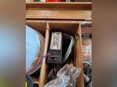 Radio controlled accessories, deluxe pwr panel, elec fuel pump, plane propellers, half gallon of fuel & other misc in wood case