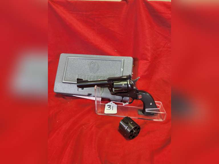 Ruger Mod: Black Hawk, 357 mag/9mm combo revolver, Ser#: 3866506, 4-5/8" brl, extra 9mm cylinder, box, book, 98% (believe to be new)