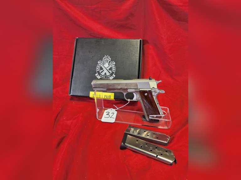 Springfield Mod: 1911 Mil-Spec, 45ACP pistol, Ser#: NM693075 , 5" brl,stainless finish, 2 mags, box & book, 98% (believe to be new)