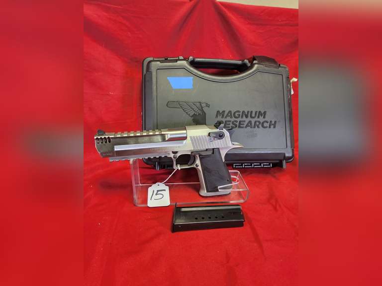 Magnum Research Mod: Desert Eagle, 44 mag pistol, Ser#: DK0068960, 6.5" brl, tac rail, stainless finish, 1 mag, box, book, 98% ( believe to be new)