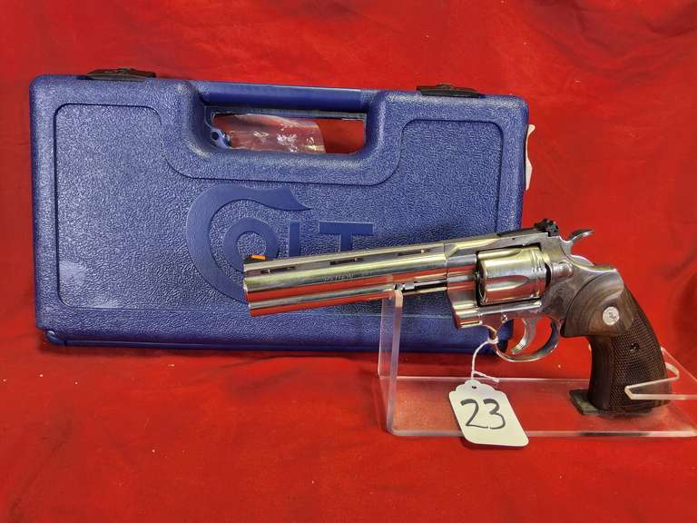Colt Mod: Python New Model, 357 mag revolver, Ser#: PY309823, 6" brl, ss, box, book,98% (believe to be new)