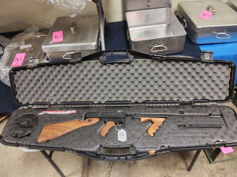 Thompson Mod: 1927A1, .45 ACP semi carbine rifle, Ser#: KN2059, Auto Ordinance Corp., 19" brl, hard case, 50 rd drum, 30rd stick mag, guitar case, 98% (believe to be new)