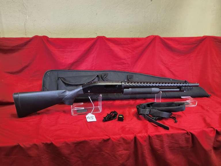 Mossberg Mod: 500, 12ga pump shotgun, Ser#: A78853, 18.5" brl, 2-3/4" or 3", syn stock, side saddle shell holder, barrel shroud, 2 tac rails, sling, soft case, red dot laser, flashlight mount, 98%