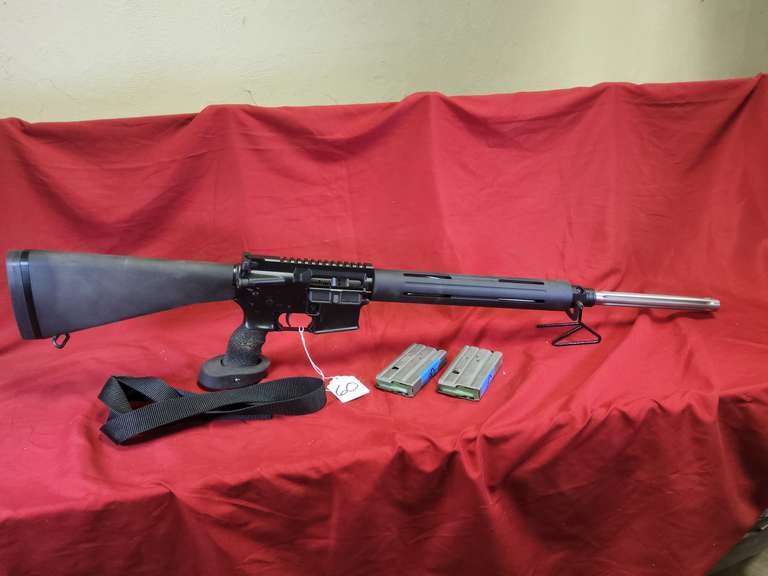 DPMS Mod: A15, 5.56/.223 cal semi rifle, Ser#: F002062, 24" stainless target brl, flat top receiver, (2) 20 rd mags, box, sling, 98% (believe to be new)