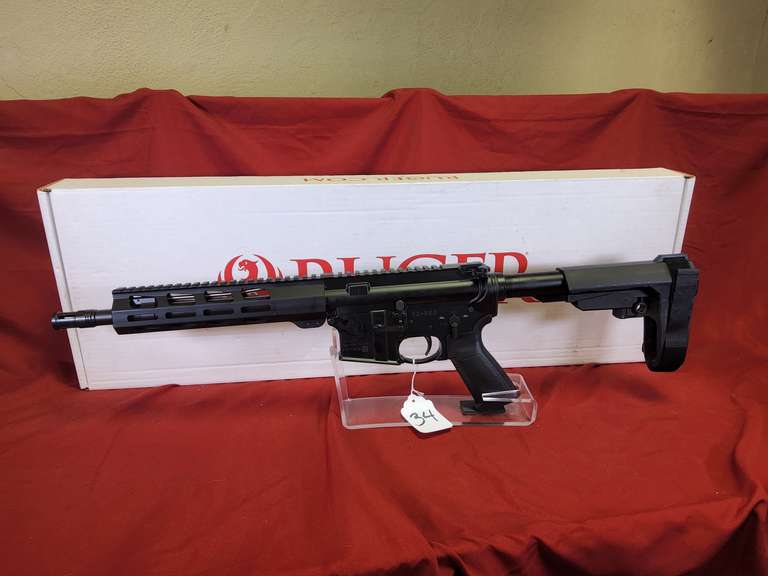 Ruger Mod: AR-556, 5.56x45 pistol, Ser#: 857-18032, 12" brl, 1 mag, box, book, tac rail, rubber on rear stock is broke (SEE PICS), 98% (believe to be new)