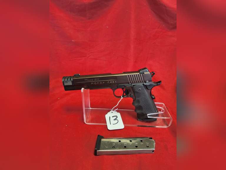 Sig Sauer Mod: 1911, .45 ACP pistol, Ser#: 54E011470, 5.5" brl, 1 mag, rubber grips, brl extension with ports, 97%