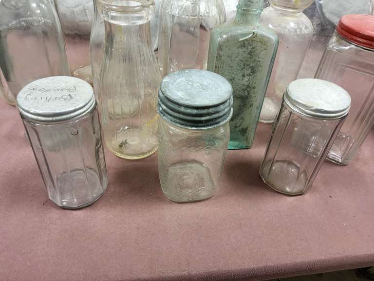 Group of vintage glass bottles various sizes