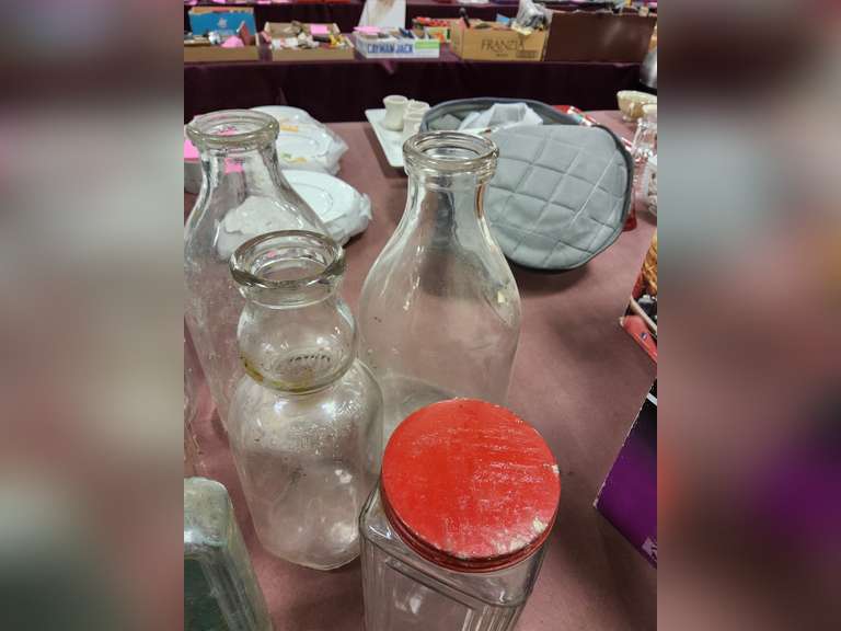 Group of vintage glass bottles various sizes