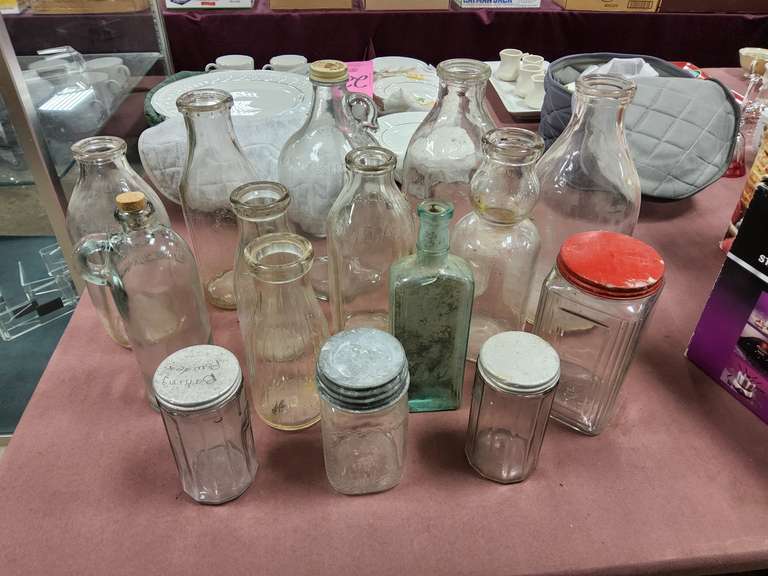 Group of vintage glass bottles various sizes
