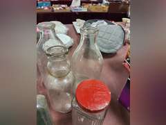 Group of vintage glass bottles various sizes