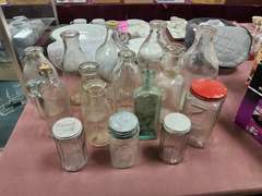 Group of vintage glass bottles various sizes