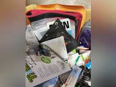 Large box of various office items/supplies: hole punches, note pads, sticky notes, pens, paper clips, & more