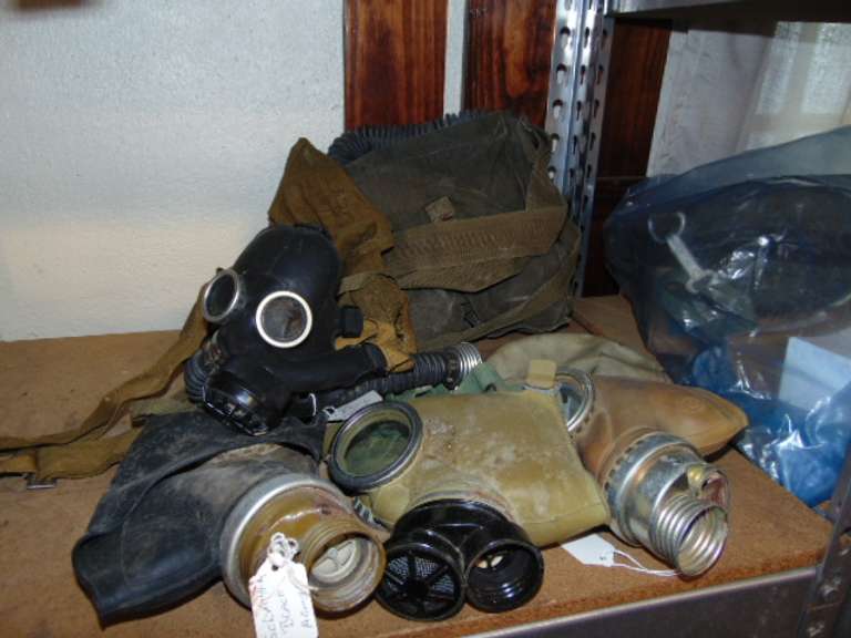 Group of various gas masks (one is for an infant)