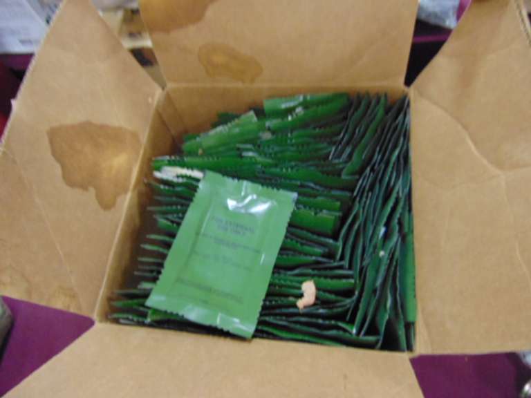 Box with packs of decontamination lotion
