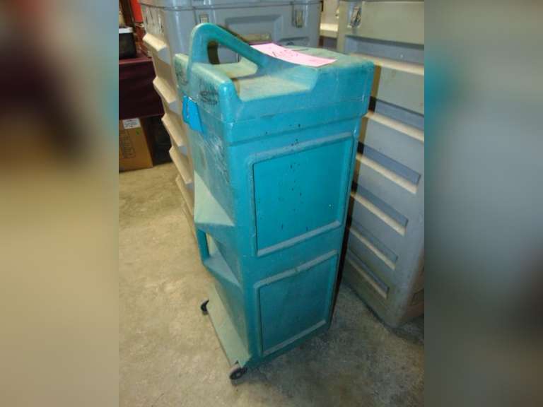 Plastic case approx 14"x 14"x 37" with wheels