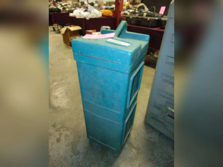 Plastic case approx 14"x 14"x 37" with wheels