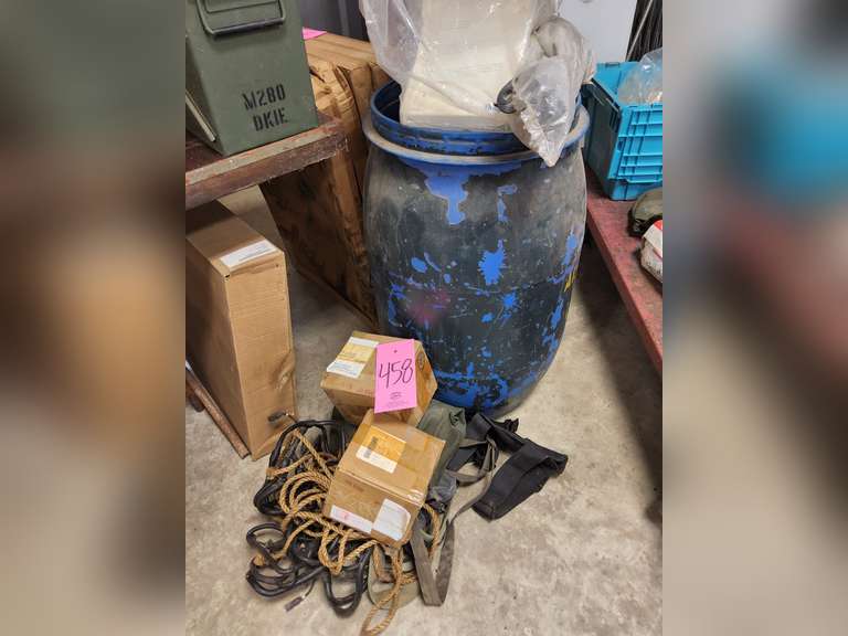 Plastic barrel of misc: rope, extension cords, holster, gas masks, filters & other items SEE PICS
