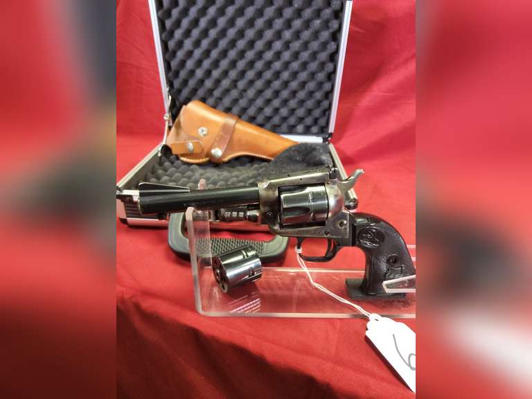 Colt Mod: New Frontier, 22 LR/22M, revolver, 4.25" brl, case hardened and blued, leather holster, hard gun case, Ser#: G100886, 96%