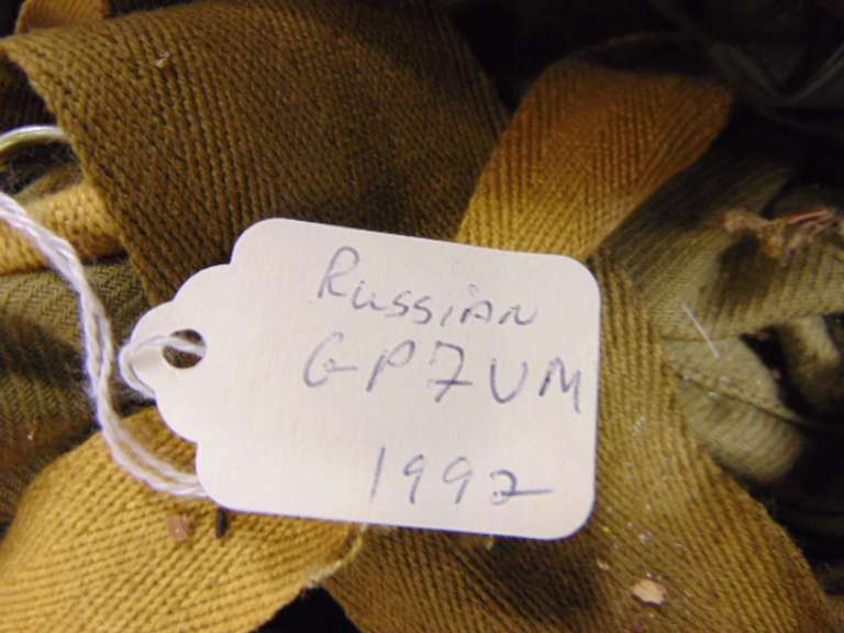 Group of various gas mask bags (some with contents, masks are missing)
