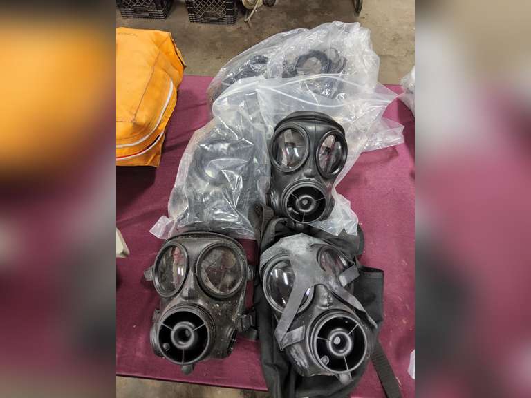 Approx 6 Avon S10 (unsure) gas masks (most look never used)